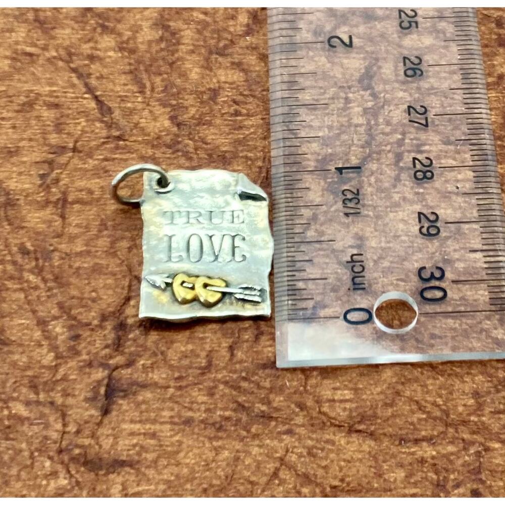 Waxing poetic storybook True Love charm